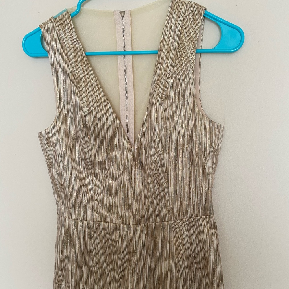 Golden romper.
